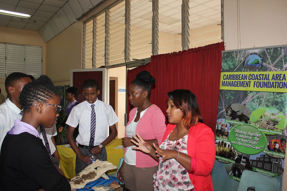 Ms. Angeli Williams-Hyman, of the Caribbean Coastal Area Management (C-CAM) Foundation sensitizing students on the importance coral reefs and the negative effects of coastal degradation, at the NEPA CSEC Sensitization Session held at the Cecil Charlton Hall, Manchester on October 10, 2018.