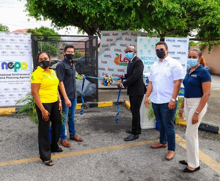 Hon. Pearnel Charles Jr. (centre) Junior Minister of Housing, Urban Renewal, Environment and Climate Change officially launches the Supermarket Plastic Recycling Programme – an initiative that facilitates the collection of plastic recyclables – at Lee’s Food Fair on Wednesday.  Looking on are: L-R- Lisa Kirkland, Manager, Pollution Monitoring and Assessment Branch, NEPA, Patrick Lee of Lee’s Food Fair Ltd., Jonathan Beckford of Recycling Partners of Jamaica and Avadawn Weir of Magna Rewards